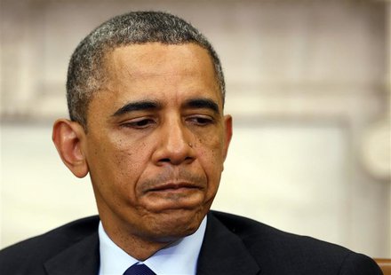 U.S. President Barack Obama listens while meeting with Myanmar's President Thein Sein in the Oval Office at the White House in Washington Ma U.S. President Barack Obama listens while meeting with Myanmar's President Thein Sein in the Oval Office at the White House in Washington Ma