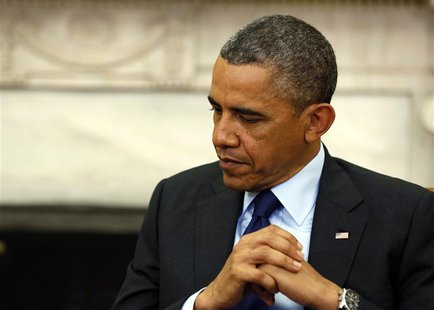 U.S. President Barack Obama listens to Myanmar's President Thein Sein in the Oval Office at the White House in Washington May 20, 2013. REUT U.S. President Barack Obama listens to Myanmar's President Thein Sein in the Oval Office at the White House in Washington May 20, 2013. REUT