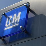 The General Motors logo is seen outside its headquarters at the Renaissance Center in Detroit, Michigan in this file photograph taken August