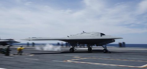 An X-47B pilot-less drone combat aircraft is launched for the first time off an aircraft carrier, the USS George H. W. Bush, in the Atlantic An X-47B pilot-less drone combat aircraft is launched for the first time off an aircraft carrier, the USS George H. W. Bush, in the Atlantic