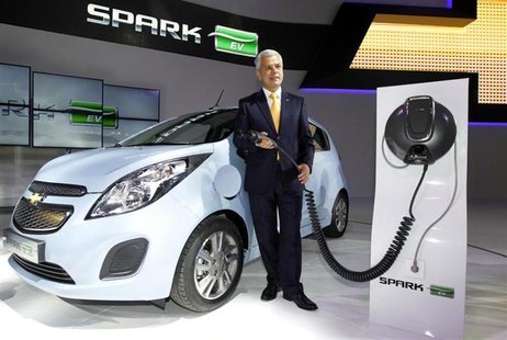 Sergio Rocha, president and CEO of GM Korea poses next to Spark EV at the Seoul motor show in Goyang, north of Seoul March 28, 2013. REUTERS Sergio Rocha, president and CEO of GM Korea poses next to Spark EV at the Seoul motor show in Goyang, north of Seoul March 28, 2013. REUTERS
