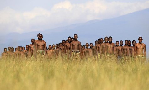 M23 rebel recruits stand at attention during a training session at the Rumangabo military camp in eastern Democratic Republic of Congo, May M23 rebel recruits stand at attention during a training session at the Rumangabo military camp in eastern Democratic Republic of Congo, May