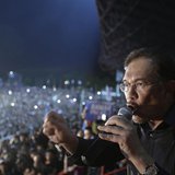 Malaysia's opposition leader Anwar Ibrahim delivers his speech during a rally in protest of the Sunday's election results at a stadium in Ke Malaysia's opposition leader Anwar Ibrahim delivers his speech during a rally in protest of the Sunday's election results at a stadium in Ke