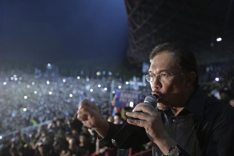 Malaysia's opposition leader Anwar Ibrahim delivers his speech during a rally in protest of the Sunday's election results at a stadium in Ke Malaysia's opposition leader Anwar Ibrahim delivers his speech during a rally in protest of the Sunday's election results at a stadium in Ke