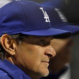 Los Angeles Dodgers manager Don Mattingly looks on against the New York Mets during the fifth inning of their MLB National League baseball g Los Angeles Dodgers manager Don Mattingly looks on against the New York Mets during the fifth inning of their MLB National League baseball g