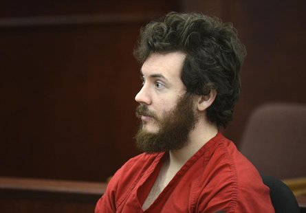 Accused Aurora theater shooting suspect James Holmes listens at his arraignment in Centennial, Colorado March 12, 2013. REUTERS/R.J. Sangost Accused Aurora theater shooting suspect James Holmes listens at his arraignment in Centennial, Colorado March 12, 2013. REUTERS/R.J. Sangost