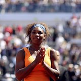 Serena Williams of the U.S. waits at the medal ceremony after winning the women's singles final match against Victoria Azarenka of Belarus a Serena Williams of the U.S. waits at the medal ceremony after winning the women's singles final match against Victoria Azarenka of Belarus a