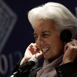 International Monetary Fund (IMF) Managing Director Christine Lagarde adjusts her headphones as she listens to a question on the second day International Monetary Fund (IMF) Managing Director Christine Lagarde adjusts her headphones as she listens to a question on the second day