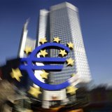 The Euro sculpture is pictured in front of the headquarters of the European Central Bank (ECB) in Frankfurt, January 17, 2012. REUTERS/Kai P