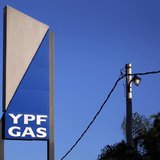 A sign with the YPF Gas logo is seen outside a gas distributor in Moreno, Buenos Aires province, April 19, 2012. REUTERS/Marcos Brindicci