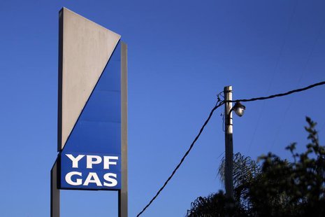 A sign with the YPF Gas logo is seen outside a gas distributor in Moreno, Buenos Aires province, April 19, 2012. REUTERS/Marcos Brindicci A sign with the YPF Gas logo is seen outside a gas distributor in Moreno, Buenos Aires province, April 19, 2012. REUTERS/Marcos Brindicci