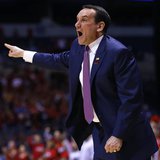 Duke Blue Devils head coach Mike Krzyzewski yells instructions to his team in the first half during their Midwest Regional NCAA men's basket Duke Blue Devils head coach Mike Krzyzewski yells instructions to his team in the first half during their Midwest Regional NCAA men's basket