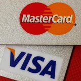 MasterCard and VISA credit cards are seen in this illustrative photograph taken in Hong Kong December 8, 2010. REUTERS/Bobby Yip MasterCard and VISA credit cards are seen in this illustrative photograph taken in Hong Kong December 8, 2010. REUTERS/Bobby Yip
