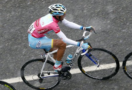 Italy's Vincenzo Nibali climbs during the 146km (91 miles) 15th stage of the Giro d'Italia, from Cesana to Col du Galibier May 19, 2013. REU Italy's Vincenzo Nibali climbs during the 146km (91 miles) 15th stage of the Giro d'Italia, from Cesana to Col du Galibier May 19, 2013. REU