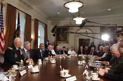 U.S. President Barack Obama (3rd L) speaks to the media after a meeting on sexual assault in the military at the White House in Washington M U.S. President Barack Obama (3rd L) speaks to the media after a meeting on sexual assault in the military at the White House in Washington M