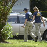 FBI personnel walk through the complex surrounding the apartment, where Ibragim Todashev was shot and killed by FBI, in Orlando, Florida, Ma FBI personnel walk through the complex surrounding the apartment, where Ibragim Todashev was shot and killed by FBI, in Orlando, Florida, Ma