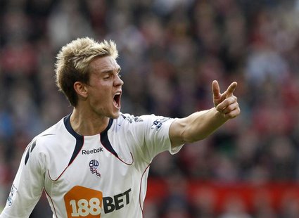 Bolton Wanderers' Stuart Holden gestures during their English Premier League soccer match at Old Trafford in Manchester, northern England, M Bolton Wanderers' Stuart Holden gestures during their English Premier League soccer match at Old Trafford in Manchester, northern England, M
