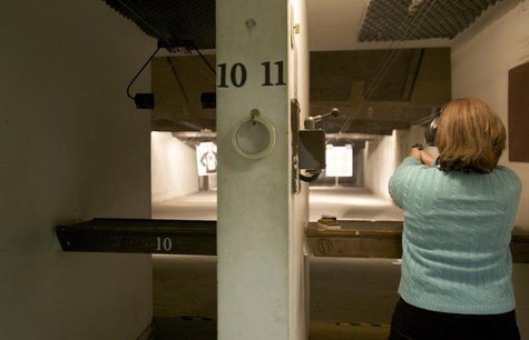 A woman at a shooting range in Connecticut April 2, 2013. REUTERS/ Michelle McLoughlin A woman at a shooting range in Connecticut April 2, 2013. REUTERS/ Michelle McLoughlin