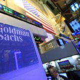 A Goldman Sachs sign is seen on at the company's post on the floor of the New York Stock Exchange, January 18, 2012. REUTERS/Brendan McDermi