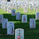 Graves at Arlington National Cemetery are decorated with flags for Memorial Day.
