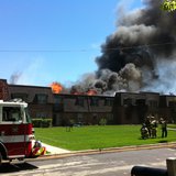 Firefighters battle an apartment complex fire at 3415 Hilltop Way in Allouez on May 23. 2013. (Photo taken by Reporter Terry Lee).