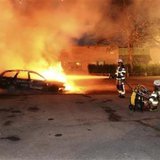 Firefighters extinguish a burning car, following riots in the Stockholm suburb of Kista late May 21, 2013, in this picture provided by Scanpix.
REUTERS/Fredrik Sandberg/Scanpix Firefighters extinguish a burning car, following riots in the Stockholm suburb of Kista late May 21, 2013, in this picture provided by Scanpix.
REUTERS/Fredrik Sandberg/Scanpix