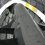 The X-37B Orbital Test Vehicle waits in the encapsulation cell of the Evolved Expendable Launch vehicle at the Astrotech facility in Titusvi The X-37B Orbital Test Vehicle waits in the encapsulation cell of the Evolved Expendable Launch vehicle at the Astrotech facility in Titusvi
