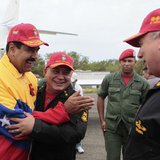 Venezuela's President Nicolas Maduro (L) embraces National Assembly President Diosdado Cabello while speaking to Defense Minister Diego Mole Venezuela's President Nicolas Maduro (L) embraces National Assembly President Diosdado Cabello while speaking to Defense Minister Diego Mole