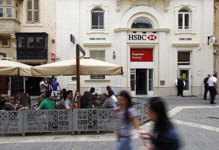 People sit in an outdoor coffee shop in front of an HSBC bank branch in Valletta May 8, 2013. REUTERS/Darrin Zammit Lupi People sit in an outdoor coffee shop in front of an HSBC bank branch in Valletta May 8, 2013. REUTERS/Darrin Zammit Lupi