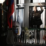 WikiLeaks founder Julian Assange gestures from the balcony of Ecuador's Embassy as he makes a speech, in central London December 20, 2012. R