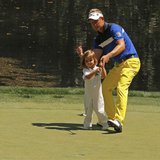 Britain's Luke Donald reacts after his daughter Ellie holed a putt on the 9th green during the annual Masters Par 3 Contest at the Augusta N Britain's Luke Donald reacts after his daughter Ellie holed a putt on the 9th green during the annual Masters Par 3 Contest at the Augusta N