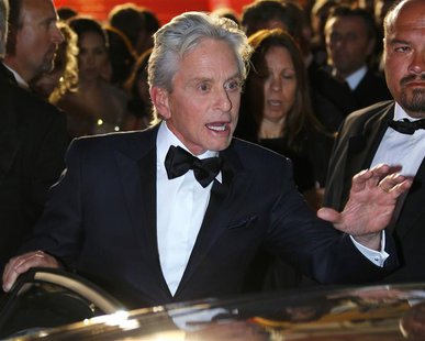 Cast members Michael Douglas leaves after the screening of the film "Behind the Candelabra" in competition during the 66th Cannes Film Festi Cast members Michael Douglas leaves after the screening of the film "Behind the Candelabra" in competition during the 66th Cannes Film Festi