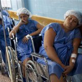 Pregnant women wait for their turn to undergo a Cesarean section (c-section) procedure at the Santa Ana public maternity hospital in Caracas