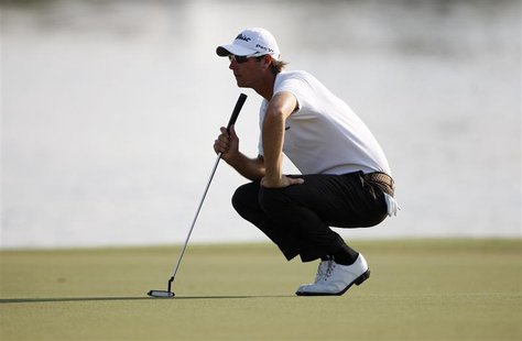 Nicolas Colsaerts of Belgium lines up his shot on the 18th green during the first round of the DP World Tour Championship at Jumeirah Golf E Nicolas Colsaerts of Belgium lines up his shot on the 18th green during the first round of the DP World Tour Championship at Jumeirah Golf E