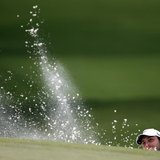 Francesco Molinari of Italy hits from a sand trap in the seventh hole during first round play in the 2013 Masters golf tournament at the Aug Francesco Molinari of Italy hits from a sand trap in the seventh hole during first round play in the 2013 Masters golf tournament at the Aug