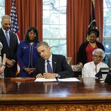 U.S. President Barack Obama signs a bill designating the Congressional Gold Medal commemorating the lives of the four young girls killed in U.S. President Barack Obama signs a bill designating the Congressional Gold Medal commemorating the lives of the four young girls killed in