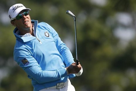 Canada's Graham DeLaet watches his tee shot on the 7th hole in final round play at the Honda Classic PGA golf tournament in Palm Beach Garde Canada's Graham DeLaet watches his tee shot on the 7th hole in final round play at the Honda Classic PGA golf tournament in Palm Beach Garde