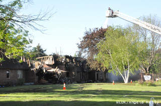 Firefighters at the scene of an Allouez apartment building fire, Friday, May 24, 2013. (courtesy of FOX 11). Firefighters at the scene of an Allouez apartment building fire, Friday, May 24, 2013. (courtesy of FOX 11).