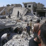 Civilians search for survivors under rubble after what activists said was shelling by forces loyal to Syria's President Bashar al-Assad, in 