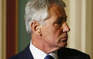 U.S. Defense Secretary Chuck Hagel takes part in a news conference on efforts to eliminate VA claims backlogs, at the U.S. Capitol in Washin