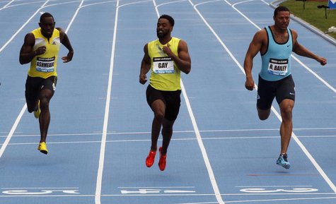 Tyson Gay of the U.S. (C) leads compatriot Ryan Bailey (R) and Nickel Ashmeade of Jamaica across the finish line winning the men's 100 meter Tyson Gay of the U.S. (C) leads compatriot Ryan Bailey (R) and Nickel Ashmeade of Jamaica across the finish line winning the men's 100 meter