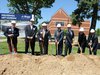 Hope College officials pose for the ceremonial ground breaking of the Kruizenga Art Museum construction on May 24, 2013. (photo courtesy Hope College)