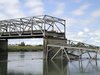 A span of highway bridge sits in the Skagit River May 24, 2013 after collapsing near the town of Mt Vernon, Washington late Thursday. REUTER