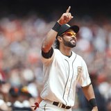 San Francisco Giants center fielder Angel Pagan gestures as he is introduced during the World Series Championship ring ceremony in San Franc San Francisco Giants center fielder Angel Pagan gestures as he is introduced during the World Series Championship ring ceremony in San Franc