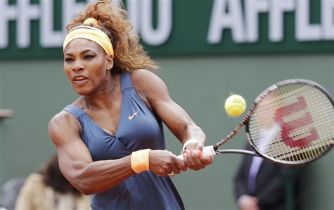 Serena Williams of the U.S. hits a return to Anna Tatishvili of Georgia during their women's singles match at the French Open tennis tournam Serena Williams of the U.S. hits a return to Anna Tatishvili of Georgia during their women's singles match at the French Open tennis tournam