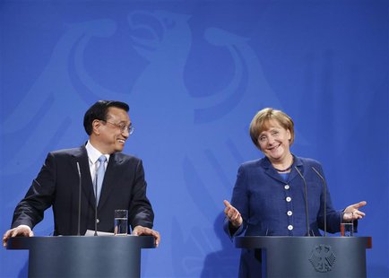 Chinese Premier Li Keqiang and German Chancellor Angela Merkel address a news conference after talks in Berlin May 26, 2013. REUTERS/Tobias Chinese Premier Li Keqiang and German Chancellor Angela Merkel address a news conference after talks in Berlin May 26, 2013. REUTERS/Tobias