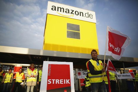 Employees of Amazon take part in a strike by German united services union Ver.di in front of an Amazon warehouse in Bad Hersfeld May 14, 201 Employees of Amazon take part in a strike by German united services union Ver.di in front of an Amazon warehouse in Bad Hersfeld May 14, 201