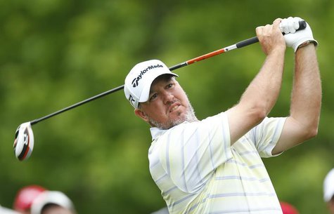 Boo Weekley of the U.S. watches his tee shot on the eighth hole during the first round of the Wells Fargo Championship PGA golf tournament a Boo Weekley of the U.S. watches his tee shot on the eighth hole during the first round of the Wells Fargo Championship PGA golf tournament a