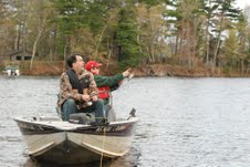 Governor Scott Walker admires that cast of one of his fishing buddies, 11-year-old August Rassmussen.
Governor Scott Walker admires that cast of one of his fishing buddies, 11-year-old August Rassmussen.