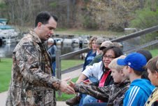 Governor Scott Walker meets with a group of students and Cable area residents at Lakewoods Resort after fishing on Lake Namakagon. Governor Scott Walker meets with a group of students and Cable area residents at Lakewoods Resort after fishing on Lake Namakagon.